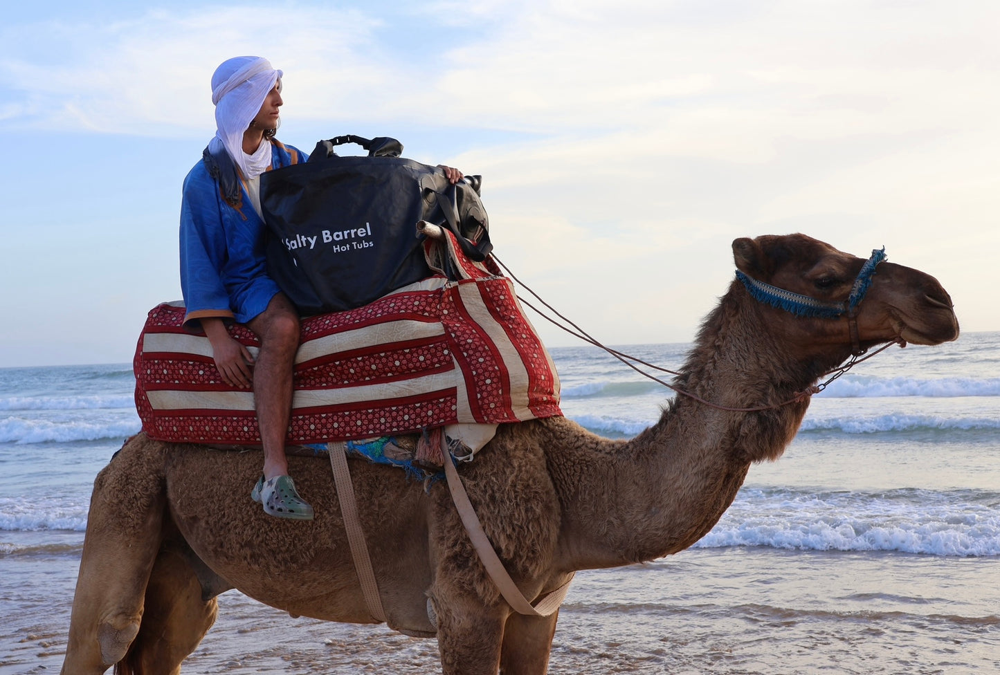 Transporting The Salty Barrel by camel